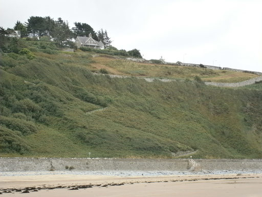 Crossing the rails again (in the front) and going up